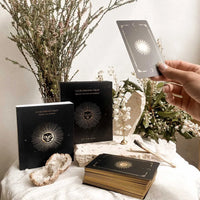 lucid dreams black eclipse tarot cards and box placed on altar